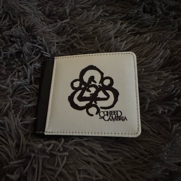 Coheed and Cambria Other - Coheed and Cambria wallet. 3 1/5 x 5 folded. 3 1/2 x 8 unfolded . New
